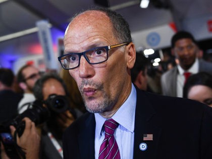 Chair of the Democratic National Committee, Tom Perez, makes his way through the spin room after the second round of the second Democratic primary debate of the 2020 presidential campaign season hosted by CNN at the Fox Theatre in Detroit, Michigan on July 31, 2019. (Photo by Brendan Smialowski / …