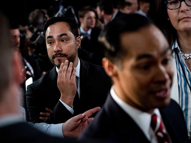 Joaquin Castro (L) listens to his brother Democratic presidential hopeful Former US Secret