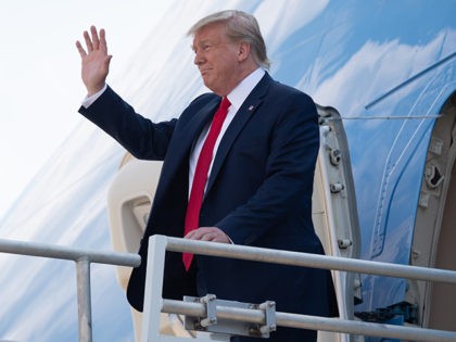 US President Donald Trump disembarks from Air Force One upon arrival at Cincinnati/Northern Kentucky International Airport in Hebron, Kentucky, August 1, 2019, as he travels to Cincinnati, Ohio, to hold a campaign rally. (Photo by SAUL LOEB / AFP) (Photo credit should read SAUL LOEB/AFP/Getty Images)