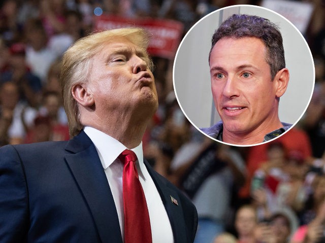 (INSET: CNN's Chris Cuomo) TOPSHOT - US President Donald Trump gestures as he arrives to a "Make America Great Again" campaign rally in Cincinnati, Ohio, on August 1, 2019. (Photo by SAUL LOEB / AFP) (Photo credit should read SAUL LOEB/AFP/Getty Images)