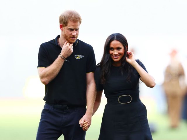 LONDON, ENGLAND - JUNE 29: Prince Harry, Duke of Sussex and Meghan, Duchess of Sussex look on during the pre-game ceremonies before the MLB London Series game between Boston Red Sox and New York Yankees at London Stadium on June 29, 2019 in London, England. (Photo by Dan Istitene - …