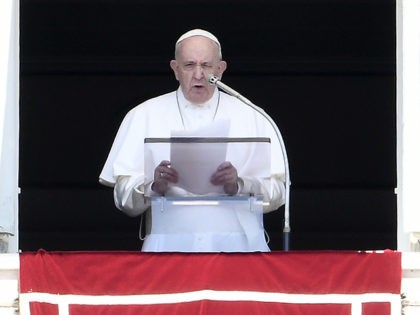 Pope Francis delivers his speech from his studio window overlooking Saint Peter's Square d