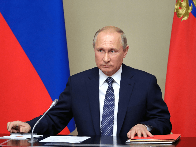 Russian President Vladimir Putin chairs a Security Council meeting at the Novo-Ogaryovo residence outside Moscow on August 5, 2019. - President Vladimir Putin on August 5, 2019 said Russia would be "forced" to develop new missiles if the US does the same, after Washington pulled out of a Cold War-era …