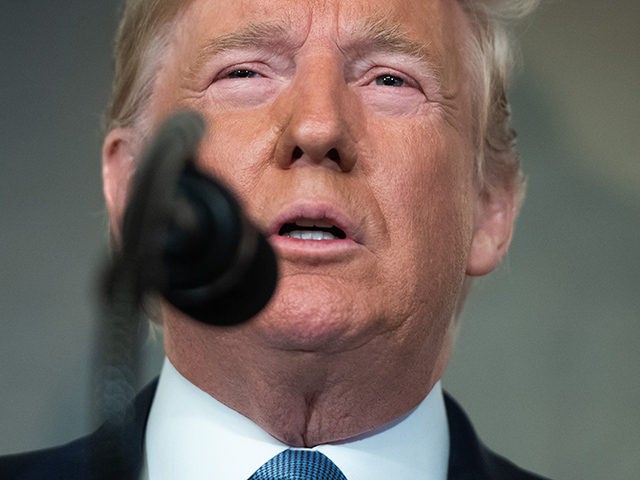 US President Donald Trump speaks about the mass shootings from the Diplomatic Reception Room of the White House in Washington, DC, August 5, 2019. - US President Donald Trump described mass shootings in Texas and Ohio as a "crime against all of humanity" as he addressed the nation on Monday …