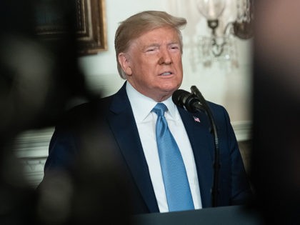 US President Donald Trump speaks about the mass shootings from the Diplomatic Reception Room of the White House in Washington, DC, August 5, 2019. - US President Donald Trump described mass shootings in Texas and Ohio as a "crime against all of humanity" as he addressed the nation on Monday …