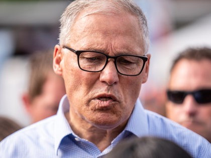 DES MOINES, IA - AUGUST 10: Democratic presidential candidate Washington Gov. Jay Inslee speaks to attendees of the Iowa State Fair on August 10, 2019 in Des Moines, Iowa. Twenty-two of the 23 politicians seeking the Democratic Party presidential nomination will be visiting the fair this week, six months ahead …