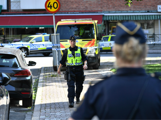 Police cordon off the scene where a woman was shot dead in the Ribersborg district of Malm