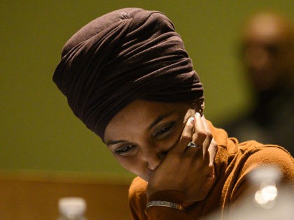 MINNEAPOLIS, MN - AUGUST 27: Rep. Ilhan Omar (D-MN) listens during a community forum on immigration at the Colin Powell Center on August 27, 2019 in Minneapolis, Minnesota. Omar joined a panel to discuss immigration policy. (Photo by Stephen Maturen/Getty Images)