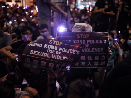People take part in a #MeToo rally in Hong Kong on August 28, 2019, to protest alleged sex
