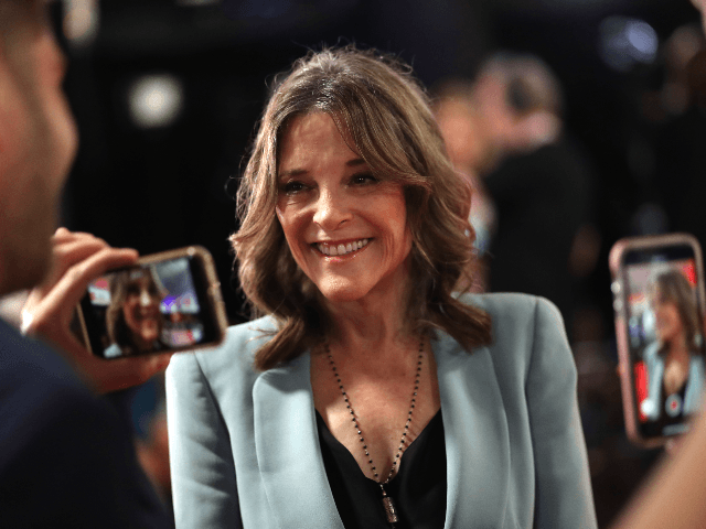 Democratic presidential candidate Marianne Williamson speaks to the media in the spin room of the Democratic Presidential Debate at the Fox Theatre July 31, 2019 in Detroit, Michigan. 20 Democratic presidential candidates were split into two groups of 10 to take part in the debate sponsored by CNN held over …