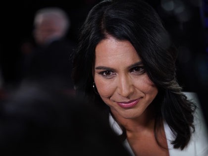 DETROIT, MICHIGAN - JULY 31: Democratic presidential candidate Rep. Tulsi Gabbard (D-HI) speaks to the media in the spin room after the Democratic Presidential Debate at the Fox Theatre July 31, 2019 in Detroit, Michigan. 20 Democratic presidential candidates were split into two groups of 10 to take part in …