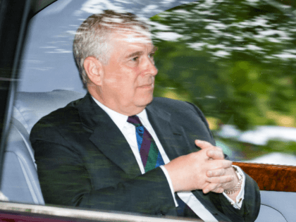 Prince Andrew, Duke of York is driven from Crathie Kirk Church following the service on Au