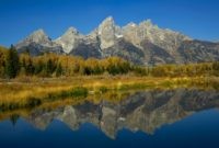 The Grand Tetons are seen October 4, 2012 in the Grand Teton National Park in Wyoming. Grand Teton National Park is located in northwestern Wyoming. Approximately 310,000 acres (130,000 ha) in size, the park includes the major peaks of the 40-mile (64 km) long Teton Range as well as most …