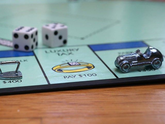 FAIRFAX, CA - FEBRUARY 06: In this photo illustration, The Monopoly iron and race car game pieces are displayed on February 6, 2013 in Fairfax, California. Toy maker Hasbro, Inc. announced today that fans of the board game Monopoly voted in an online contest to eliminate the iron playing figure …