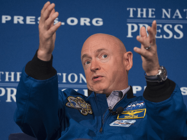 Retired NASA Astronaut Mark Kelly speaks about his time in space during an event at the National Press Club in Washington, DC, September 14, 2015.AFP PHOTO / SAUL LOEB (Photo credit should read SAUL LOEB/AFP/Getty Images)