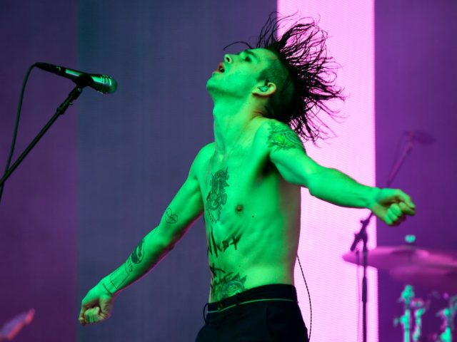 Matthew Healy of English rock band The 1975 performs on the Main Stage on the third day of the TRNSMT music Festival on Glasgow Green, in Glasgow, Scotland on July 9, 2017. / AFP PHOTO / Andy Buchanan (Photo credit should read ANDY BUCHANAN/AFP/Getty Images)
