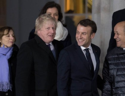 CAMBERLEY, ENGLAND - JANUARY 18: Foreign Secretary Boris Johnson (left) and French Presid