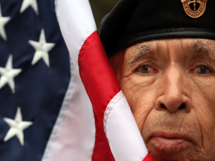 Frank Squirrel, U.S. Army Korean War veteran and member of the Cherokee Nation Color Guard, looks on before the start of the annual Veterans Day parade November 11, 2009 in New York City. The nation's largest Veterans Day parade featuring 20,000 participants in New York is celebrating its 90th anniversary. …