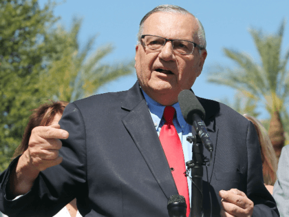 Former Maricopa County Sheriff Joe Arpaio speaks to the media in front of the Arizona Stat