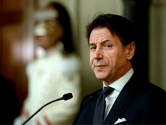 Italys Prime Minister Giuseppe Conte addresses the media following a meeting with the Ital