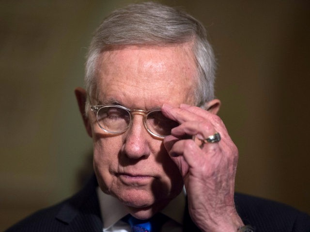 Senate Minority Leader Harry Reid, D-Nev., listens during a media availability after the S