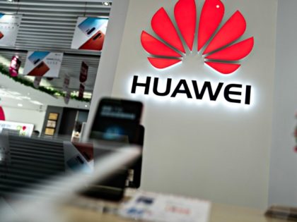 A Huawei logo is displayed at a retail store in Beijing on May 20, 2019. - US internet gia