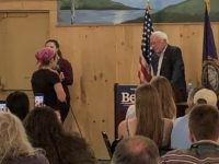 Bernie Sanders and Jewish leftist at town hall (Joel Pollak / Breitbart News)
