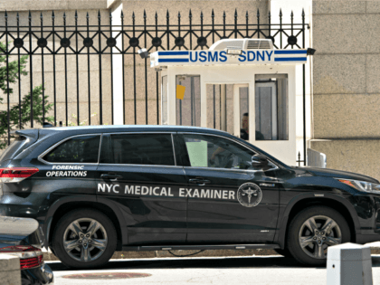 A New York Medical Examiner's car is parked outside the Metropolitan Correctional Cen