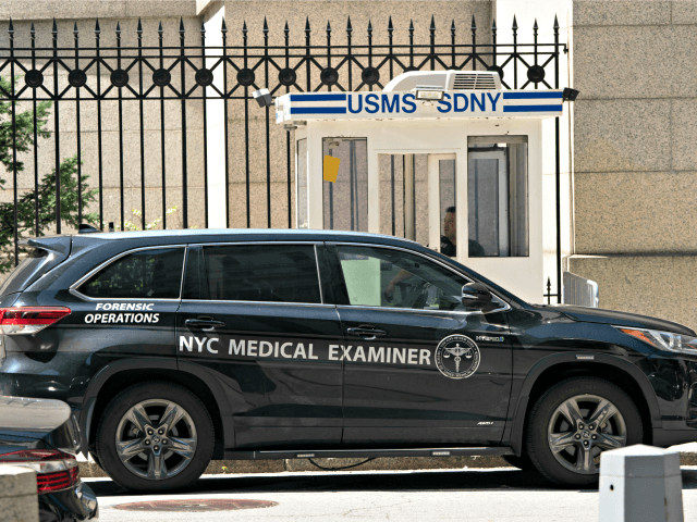 A New York Medical Examiner's car is parked outside the Metropolitan Correctional Center where financier Jeffrey Epstein was being held, on August 10, 2019, in New York. - Epstein has committed suicide in prison while awaiting trial on charges that he trafficked underage girls for sex, officials and media reported …