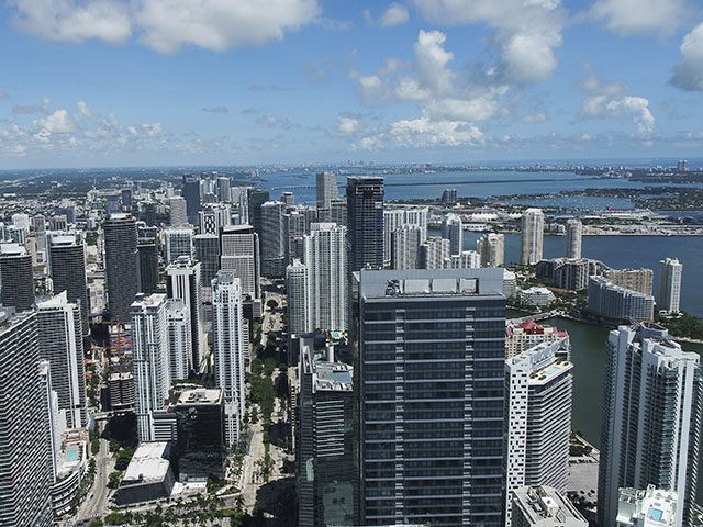 The Miami skyline is seen in this aerial view with cranes, Thursday, Sept. 7, 2017, in Miami. As Hurricane Irma threatens to pound Miami with winds of mind-boggling power, a heavyweight hazard looms over the city's skyline: two dozen enormous construction cranes.(DroneBase via AP)