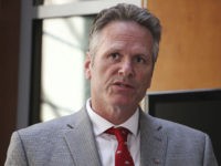 Alaska Gov. Mike Dunleavy speaks at a news conference Monday, Aug. 5, 2019, in Anchorage, Alaska. State health department officials discussed proposals they are seeking for a study on the feasibility of privatizing Alaska's state-owned psychiatric hospital and announced the Alaska Psychiatric Institute is in good standing with federal requirements. …