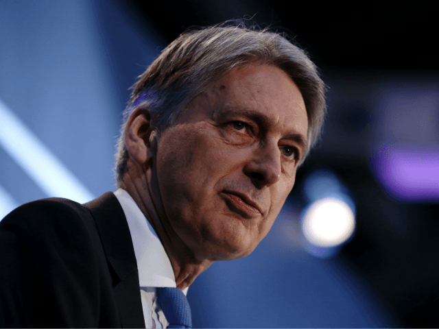 Britain's Chancellor of the Exchequer Philip Hammond speaks during the The International F