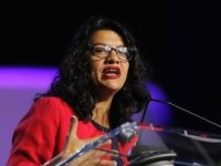 Rep. Rashida Tlaib, D-Mich., addresses the 110th NAACP National Convention, Monday, July 22, 2019, in Detroit. (AP Photo/Carlos Osorio)