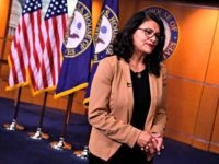 US Representative Rashida Tlaib (D-MI) looks on during an interview after a press conference, to address remarks made by US President Donald Trump earlier in the day, at the US Capitol in Washington, DC on July 15, 2019. - President Donald Trump stepped up his attacks on four progressive Democratic …