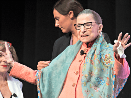 Supreme Court Associate Justice Ruth Bader Ginsburg waves to the audience as she prepares to speak at the Library of Congress National Book Festival in Washington, Saturday, Aug. 31, 2019. (AP Photo/Cliff Owen)