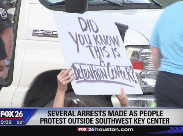 Protesters outside an ORR juvenile migrant shelter in Houston. (Fox 26 Houston Video Screenshot)