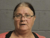 Sherry Kirk, 62, of War, has been charged with attempt to kill or injure a person by poison.