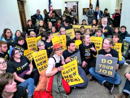 Protesters with the Sunrise Movement stage a sit-in in the office of Rep. Steny Hoyer, now the House majority leader, late last year to demand a Green New Deal.