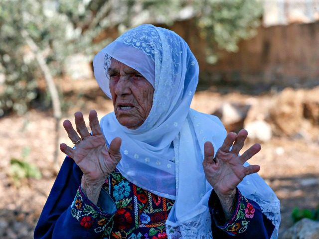 Muftia Tlaib, the maternal grandmother of US Congresswoman Rashida, is pictured outside her home in the village of Beit Ur al-Fauqa, in the occupied West Bank on August 15, 2019. - US President Donald Trump called on Israel to bar a looming planned visit by two US congresswomen who have