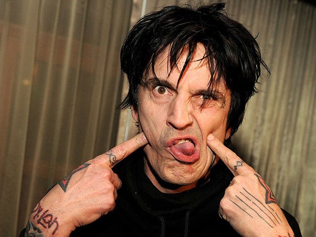LOS ANGELES, CA - APRIL 10: Musician Tommy Lee poses at the after party for the screening of "Waiting for Lightning" at the Roosevelt Hotel on April 10, 2012 in Los Angeles, California. (Photo by Kevin Winter/Getty Images)