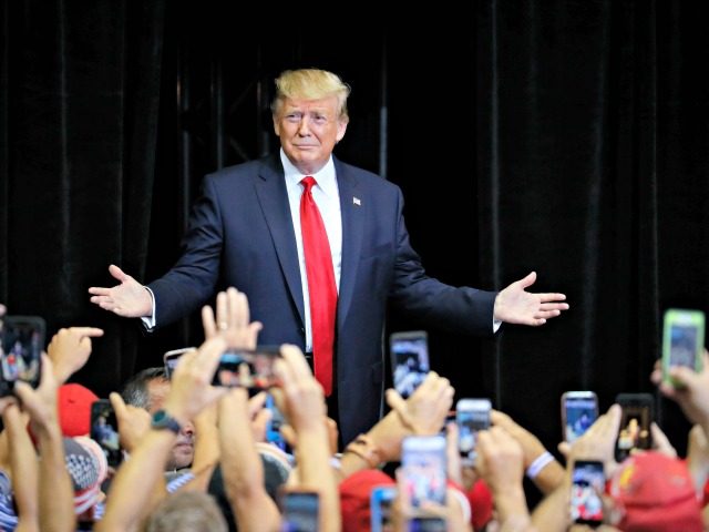 President Donald Trump arrives at a campaign rally at U.S. Bank Arena, Thursday, Aug. 1, 2019, in Cincinnati. (AP Photo/John Minchillo)