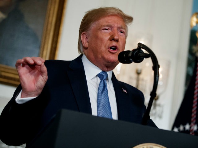 President Donald Trump speaks about the mass shootings in El Paso, Texas and Dayton, Ohio, in the Diplomatic Reception Room of the White House, Monday, Aug. 5, 2019, in Washington. (AP Photo/Evan Vucci)