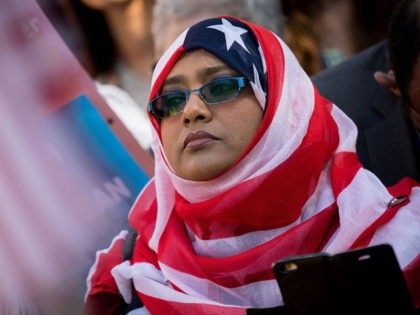 WASHINGTON, DC - OCTOBER 18: A woman wears an American flag themed hijab as she attends a