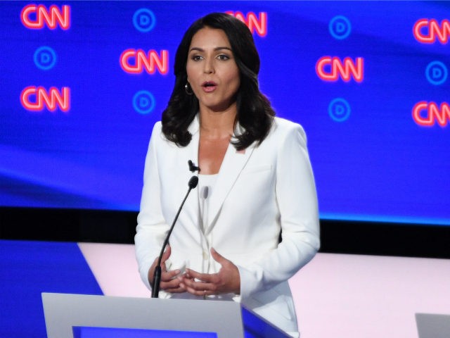 Democratic presidential hopeful US Representative for Hawaii's 2nd congressional district Tulsi Gabbard delivers her opening statement during the second round of the second Democratic primary debate of the 2020 presidential campaign season hosted by CNN at the Fox Theatre in Detroit, Michigan on July 31, 2019. (Photo by Jim WATSON …