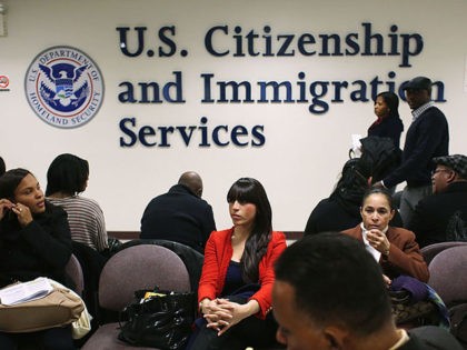 NEW YORK, NY - JANUARY 29: Immigrants wait for their citizenship interviews at the U.S. Citizenship and Immigration Services (USCIS), district office on January 29, 2013 in New York City. Some 118,000 immigrants applied for U.S. citizenship in the New York City dictrict in 2012. (Photo by John Moore/Getty Images)