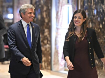US Rep. Michael McCaul (R-TX), flanked by a presidential transition team aide Madeleine Westerhout, arrives at Trump Tower during another day of meetings with President-elect Donald Trump November 29, 2016 in New York. / AFP / TIMOTHY A. CLARY (Photo credit should read TIMOTHY A. CLARY/AFP/Getty Images)