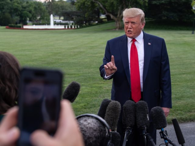US President Donald Trump speaks to the press at the White House as he departs for Cincinnati to hold a campaign rally in Washington, DC, on August 1, 2019. (Photo by NICHOLAS KAMM / AFP) (Photo credit should read NICHOLAS KAMM/AFP/Getty Images)