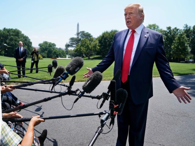 WASHINGTON, DC - JULY 30: U.S. President Donald Trump talks to journalists after returning