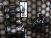 ELOY, AZ - JULY 30: Immigrants sit in their housing cell in the women's wing of the detention facility for illegal immigrants on July 30, 2010 in Eloy, Arizona. Most immigrants at the center are awaiting deportation or removal and return to their home countries, while some are interned at …