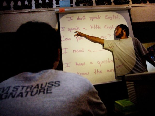 LAKESIDE, CA - JANUARY 27: Teacher Kenton Hundely teaches English to a class of youth, foreign born deportees at the Southwest Key compund January 27, 2005 in Lakeside, California. Southwest Key is a federally funded boarding home for children who are in the United States illegally and are awaiting deportation …